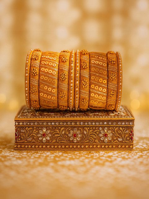 Arshia Fashions Set Of 10 Stone Studded Bangle