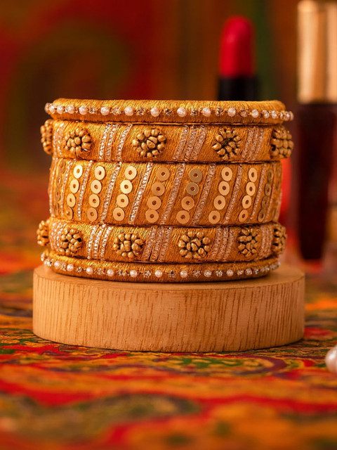Arshia Fashions Set Of 10 Stone Studded Bangle