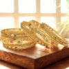 MANKAIROOP Women Pack of 6 Brass High Gold Bangles with Ruby & Green Stones